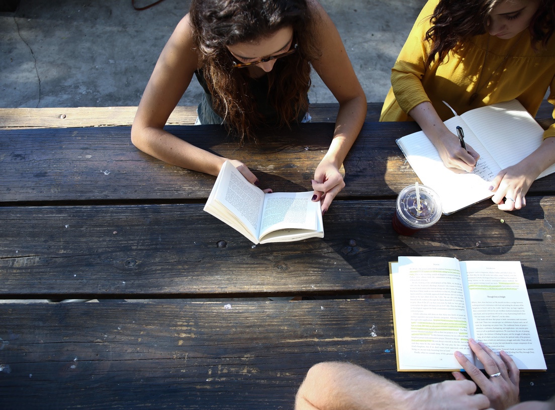 Group of students studying on a table